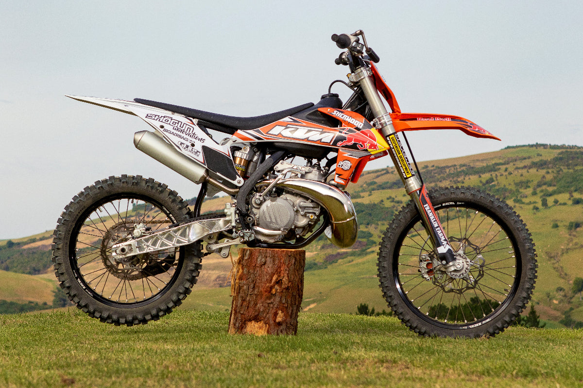 Shortened CNC swingarm installed on KTM FMX bike