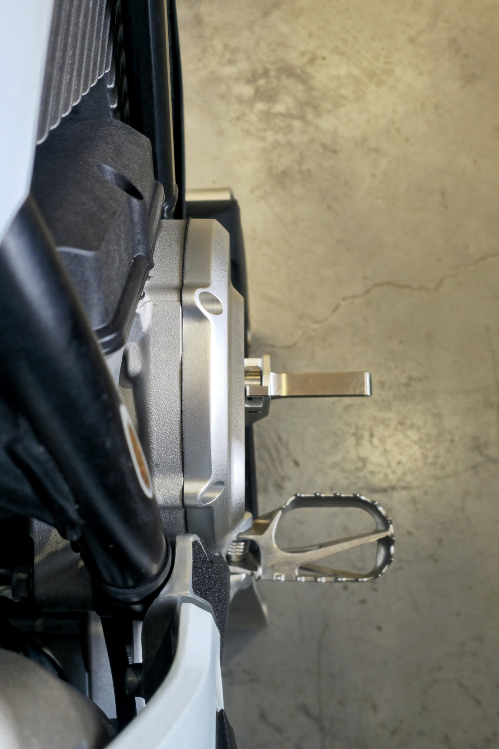 Shogun foot hook mounted on the Stark VARG’s right side, captured in a close-up image.