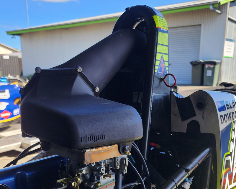 Custom 3D printed cold air intake installed in tight engine bay between bodywork and engine, designed using 3D scanning and CAD for precise fit