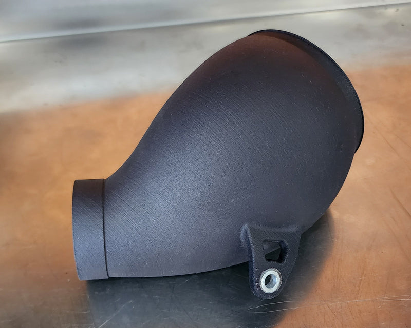 Custom air intake for the Shogun FMX Bike designed to centralize packaging and improve throttle response