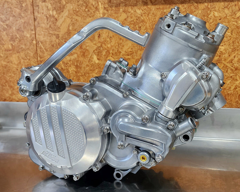 Modified KTM 250 SX two stroke engine built for freestyle motocross with single speed transmission and lightweight performance components