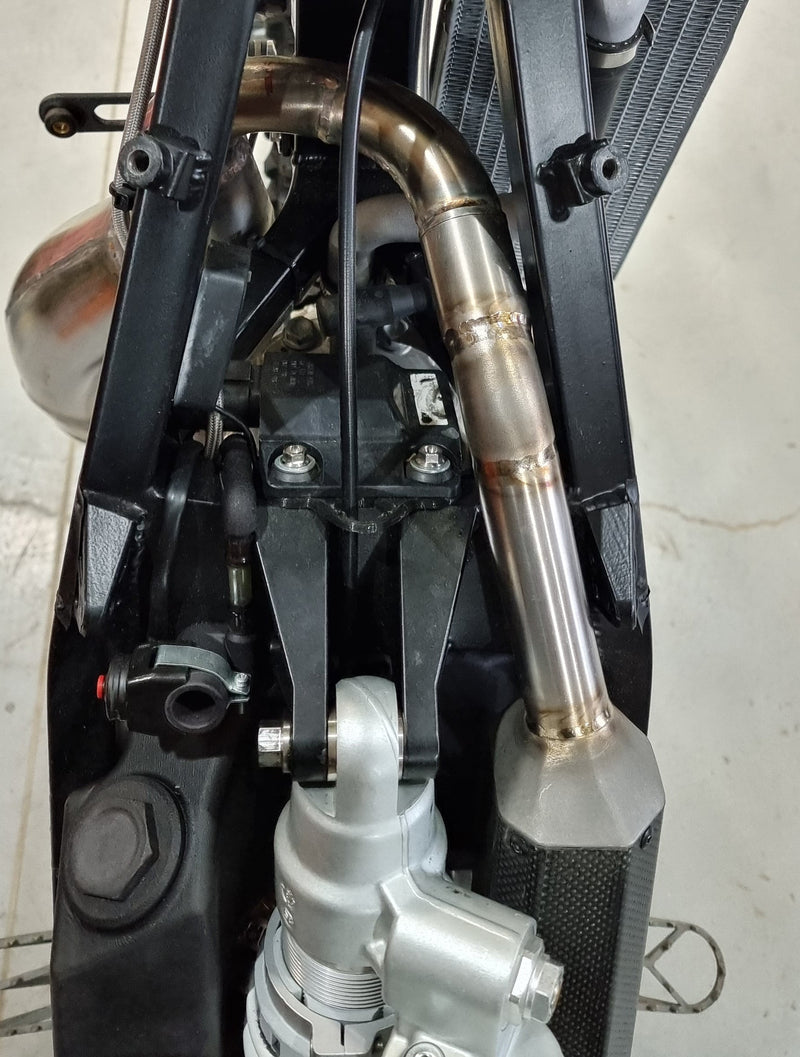 Custom motorcycle silencer made from titanium and carbon fibre for the Shogun FMX Bike exhaust system
