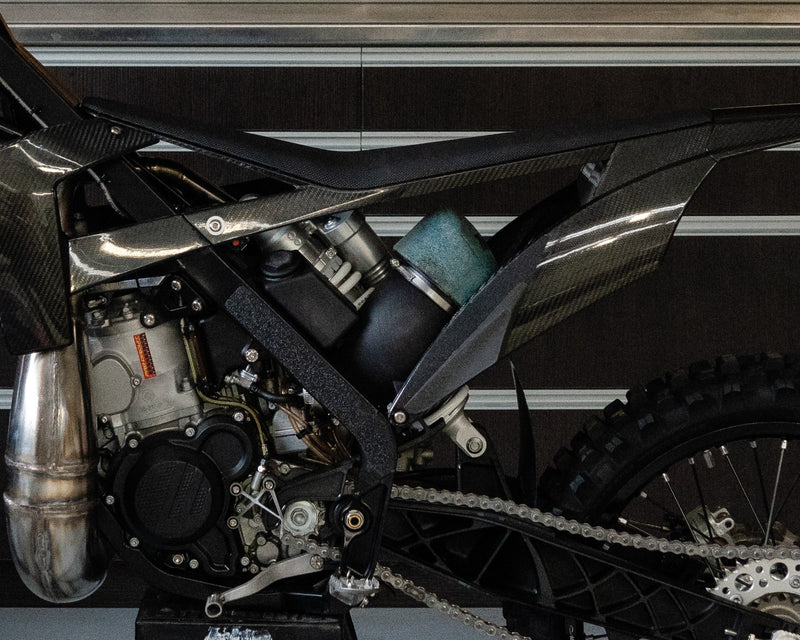 WP PDS shock mounted in the Shogun FMX Bike showing the custom frame integration and rear suspension layout