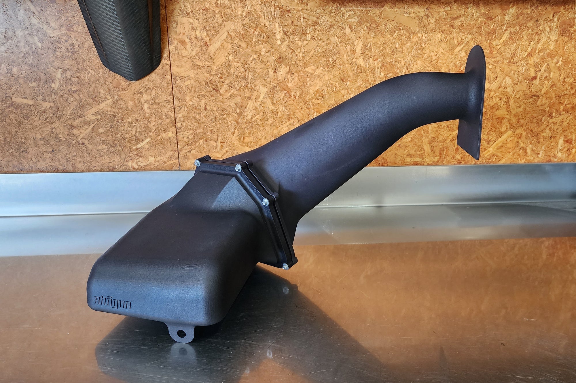 Close up of custom SLS 3D printed cold air intake in nylon fiberglass material, designed for tight fitment and high airflow performance