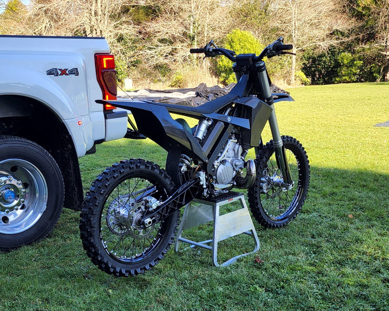 Shogun FMX Bike on a stand before ride showing the completed custom chassis, bodywork, and full build assembly