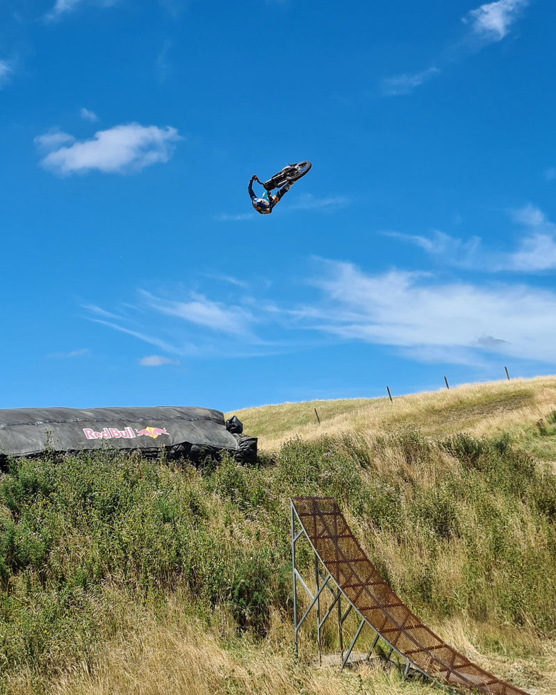 Shogun FMX Bike being ridden upside down in a flat spin, showing the balance, agility, and FMX specific design of the custom build