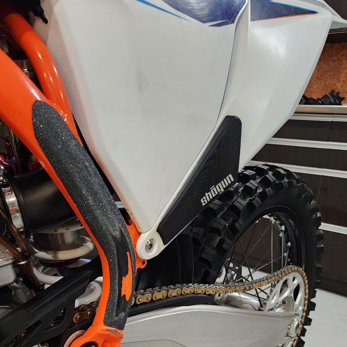 3D printed KTM side panel grips designed for increased bike control and stability