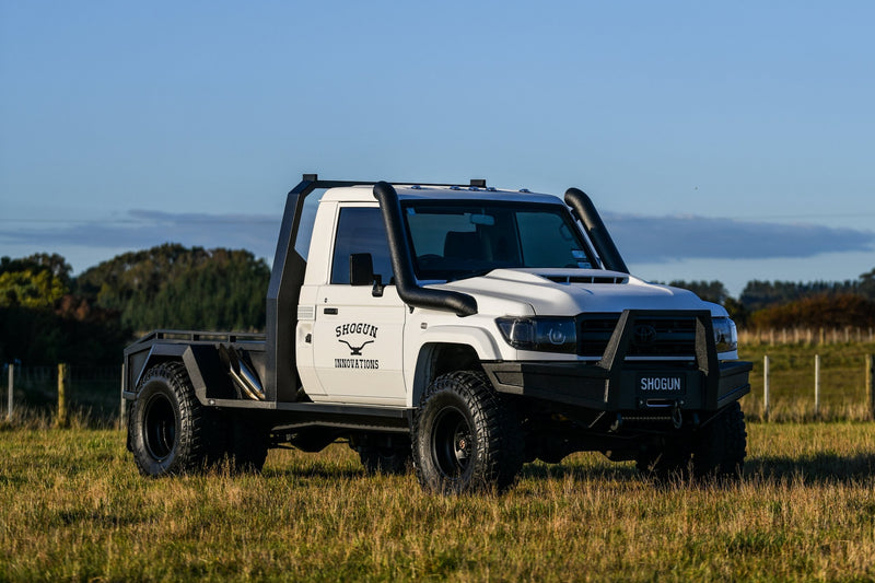 Side profile of custom Land Cruiser 79 Series dually truck built by Shogun Innovations